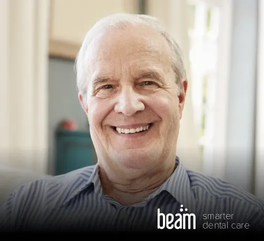 Beam Dental Dentist Howell – patient viewing intraoral camera images at Riverpark Dental of Howell