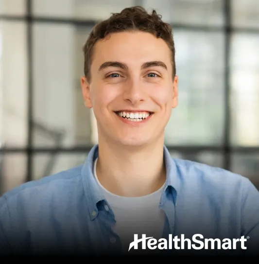 HealthSmart Dentist Howell – relaxed patient talking with a dentist at Riverpark Dental of Howell
