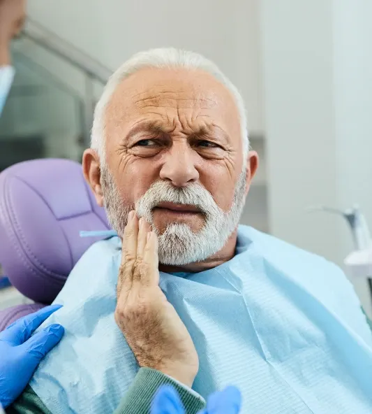 Tooth Extraction Howell – dentist explaining a gentle tooth removal at Riverpark Dental of Howell
